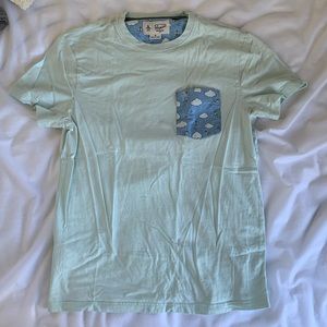 Penguin tee paper airplane front pocket